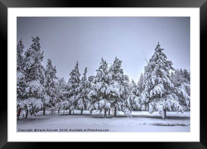 Snowfall and trees Framed Mounted Print by Kevin Arscott