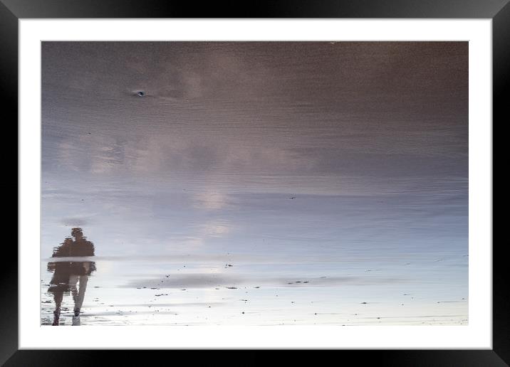 Shadow of two people walking on the beach at sunse Framed Mounted Print by Sophie Shoults
