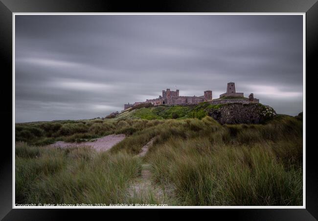 Bamburgh Castle Framed Print by Peter Anthony Rollings