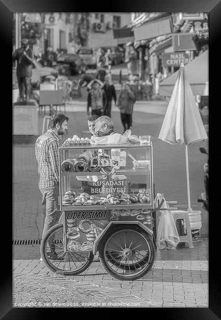 Chitchat in Kusadasi,Turkey  Framed Print by Ian Stone