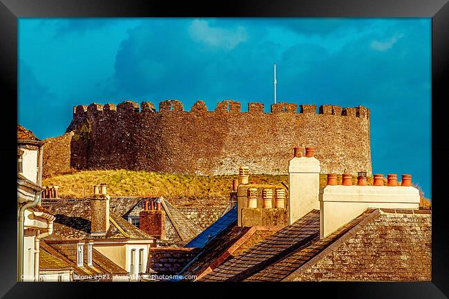 Totnes castle through the rooftops  Framed Print by Ian Stone