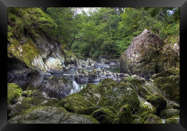 Rocky stream in the Fairy Glenn, Wales Framed Print by Philip Brown