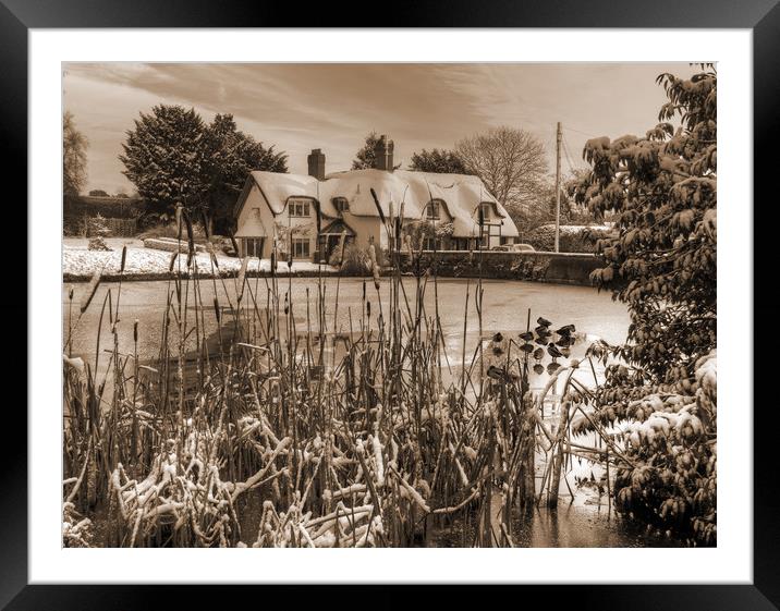 The old English cottage in winters Snow - Sepia Ve Framed Mounted Print by Philip Brown