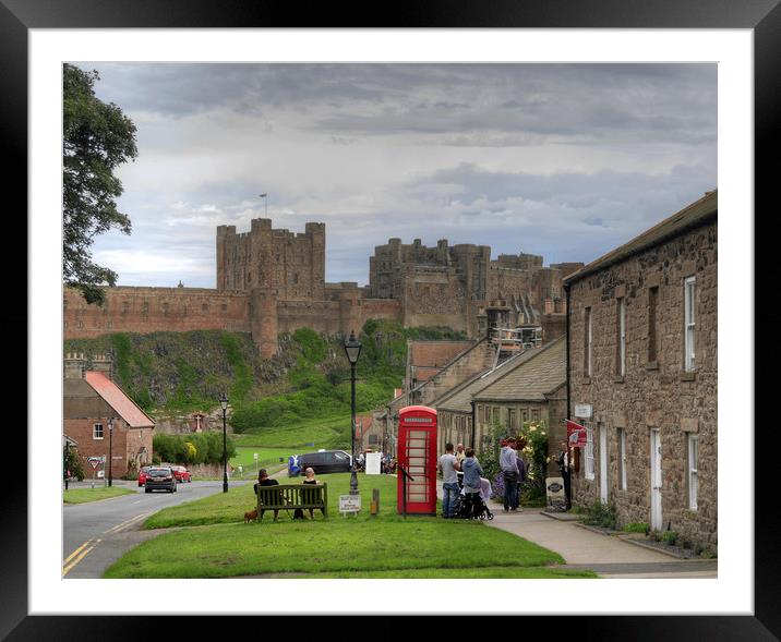 Bamburgh Village and Castle - Colour Framed Mounted Print by Philip Brown