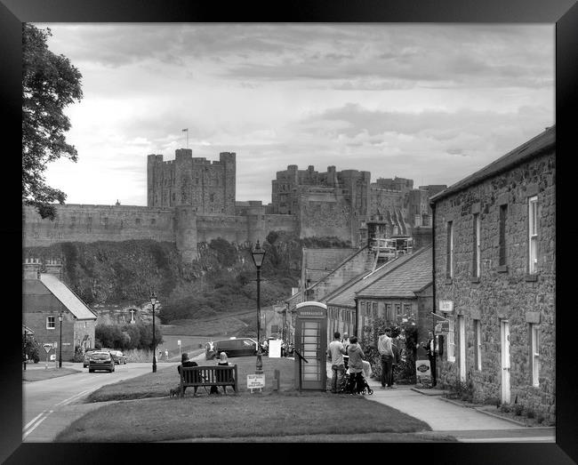 Bamburgh Village and Castle - Black & White Framed Print by Philip Brown