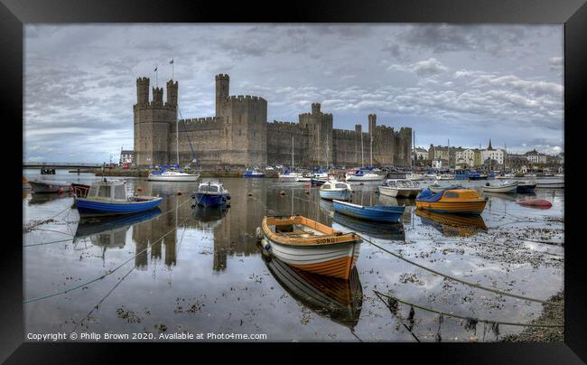 Caernarfon Castle and Harbour Framed Print by Philip Brown