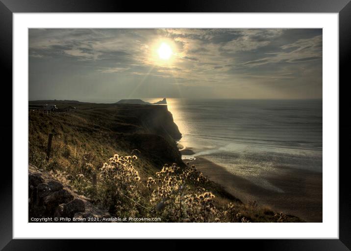 Sun setting across Worms Head, Rhosilli, The Gower Framed Mounted Print by Philip Brown