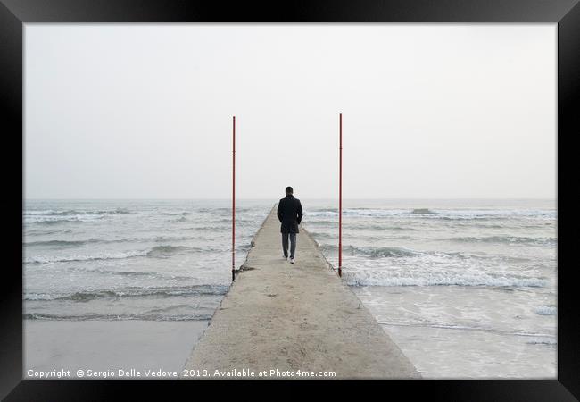 Walking on the sea Framed Print by Sergio Delle Vedove