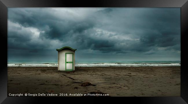 A thunderstorm on the beach Framed Print by Sergio Delle Vedove