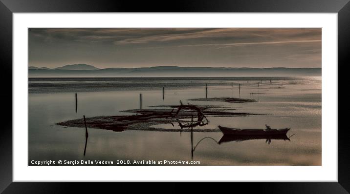the light of sunset on the lagoon Framed Mounted Print by Sergio Delle Vedove