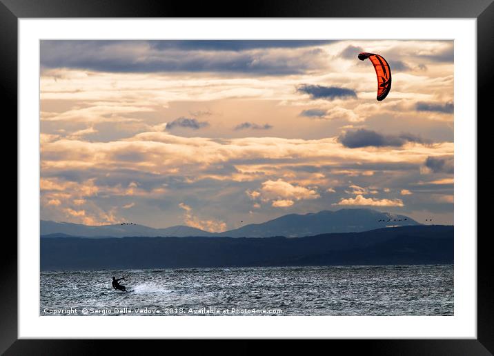 kitesurfing on the sea Framed Mounted Print by Sergio Delle Vedove