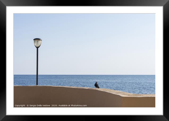 In front of the sea Framed Mounted Print by Sergio Delle Vedove