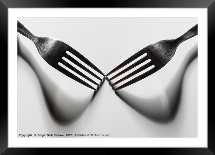 The fork shadows Framed Mounted Print by Sergio Delle Vedove