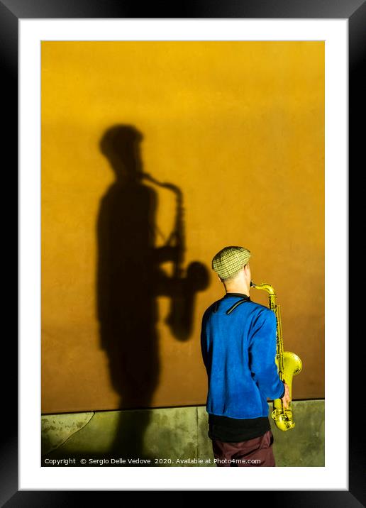 the sax player  Framed Mounted Print by Sergio Delle Vedove