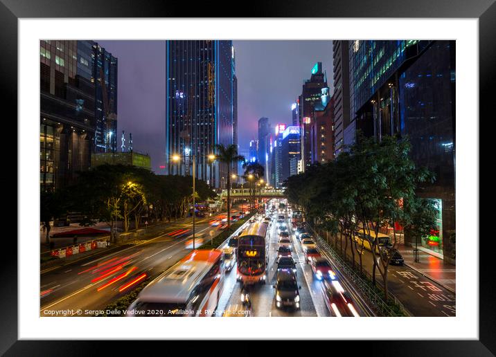 Hong Kong downtown at night  Framed Mounted Print by Sergio Delle Vedove