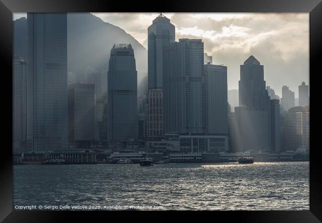 Victoria harbor in Hong Kong Framed Print by Sergio Delle Vedove