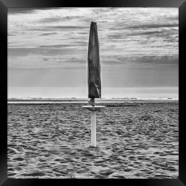 Beach umbrella Framed Print by Sergio Delle Vedove