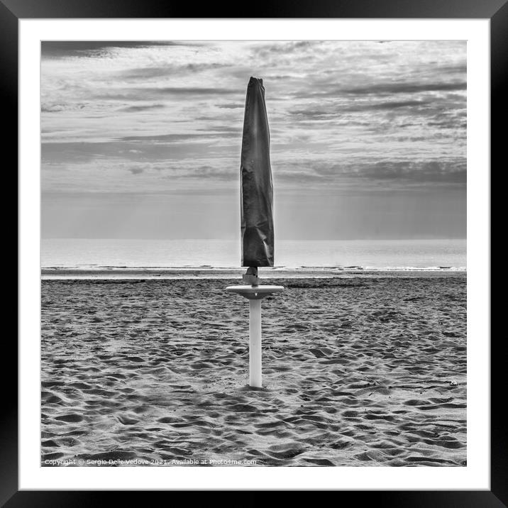 Beach umbrella Framed Mounted Print by Sergio Delle Vedove