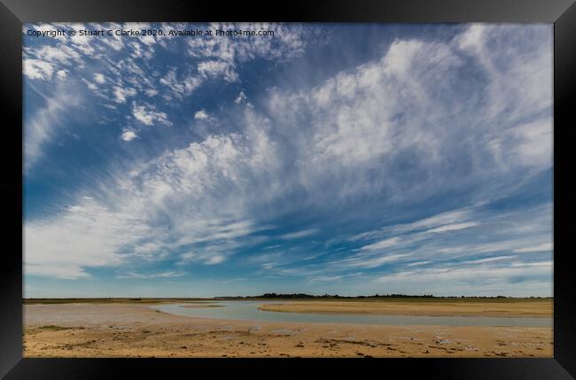 Low tide at Pagham Harbour Framed Print by Stuart C Clarke