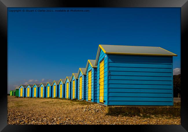 Beach huts Framed Print by Stuart C Clarke