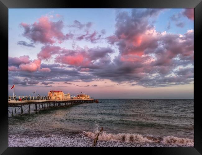 Sunset over Worthing pier Framed Print by Carolyn Brown-Felpts