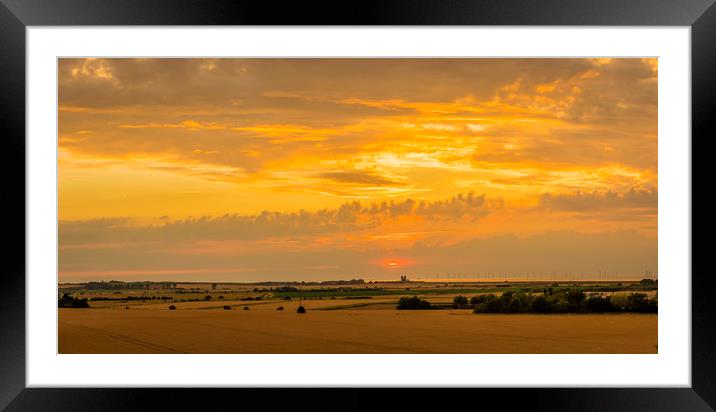 Sunset across the marshes to Reculver Towers Framed Mounted Print by Robin Lee