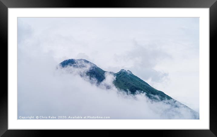 Arenal Volcano peaking through clouds Framed Mounted Print by Chris Rabe