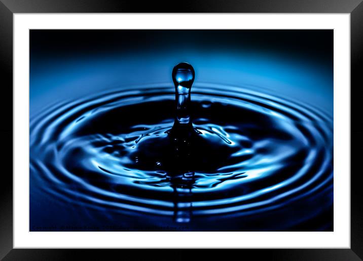 A water droplet Framed Mounted Print by Martin Bowra