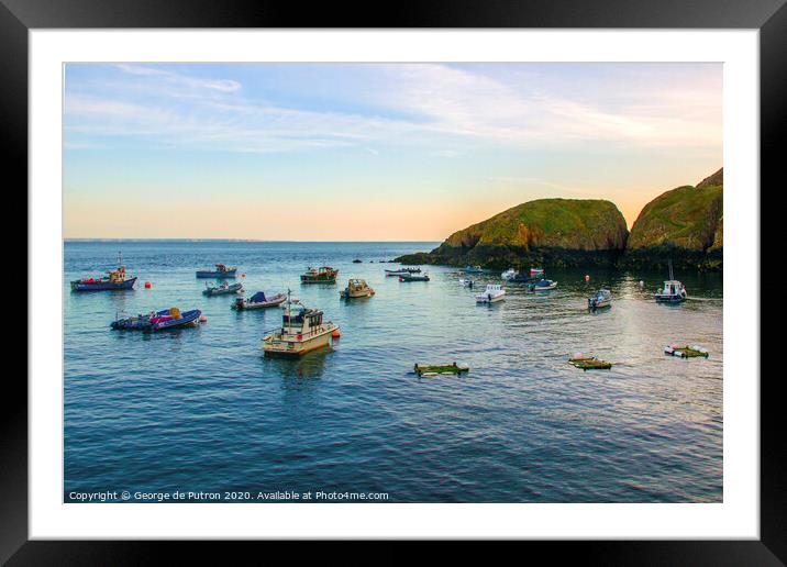 Boats moored outside Creux Harbour Sark  Framed Mounted Print by George de Putron