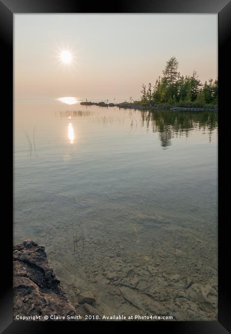 Beautiful calm sunset on the clear Lake Huron  Framed Print by Claire Smith