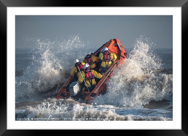 To the rescue - an RNLI inshore lifeboat launches  Framed Mounted Print by WATCHANDSHOOT 