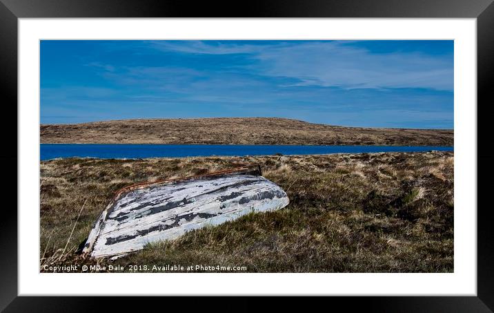 Old rowing boat near loch in Kearvaig Framed Mounted Print by Mike Dale
