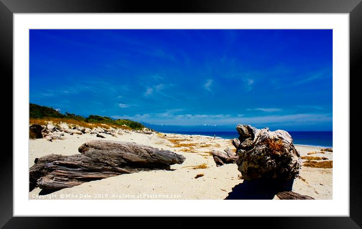 Empty beach with driftwood, North Island, New Zeal Framed Mounted Print by Mike Dale