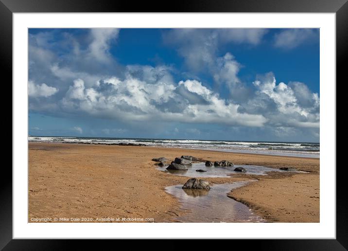 Rocks on a Sandy Beach Framed Mounted Print by Mike Dale