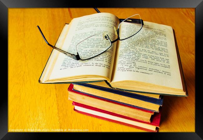 Stack of Antique Books and Spectacles 1 Framed Print by Mike Dale