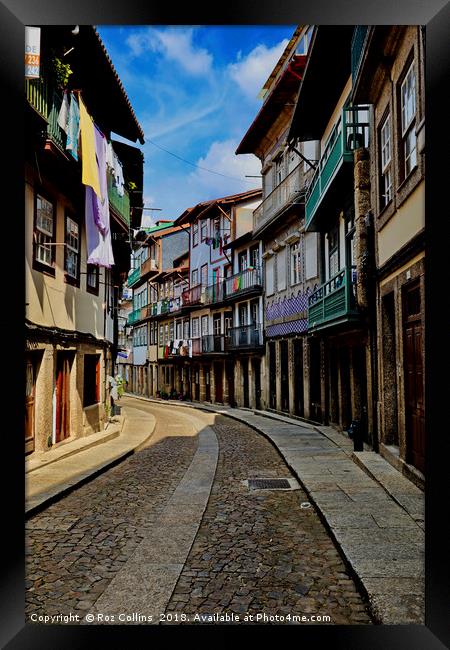 Street Scene Guimaraes, Portugal Framed Print by Roz Collins