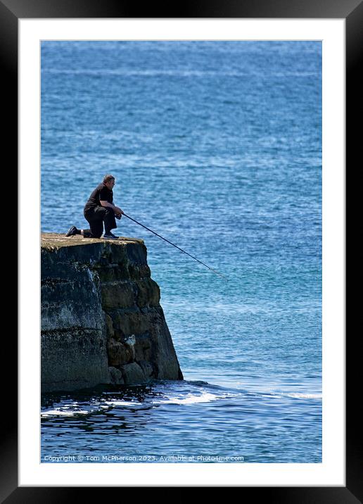 Outdoor man fishing off pier Framed Mounted Print by Tom McPherson