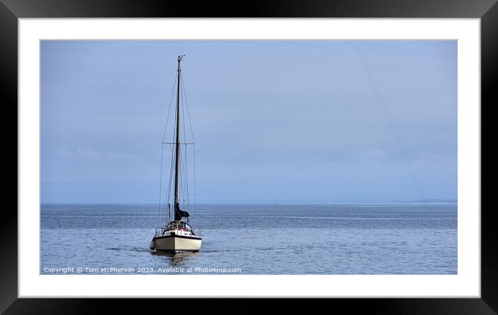 "Solitude: A Lone Yacht Sailing on the Serene Mora Framed Mounted Print by Tom McPherson