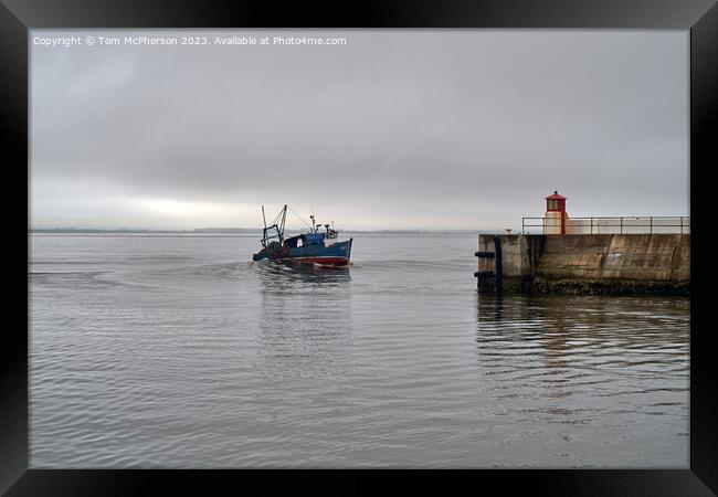 Leaving Burghead harbour Framed Print by Tom McPherson