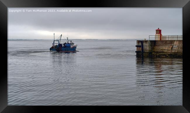 Fishing boat, leaving Burghead harbour Framed Print by Tom McPherson