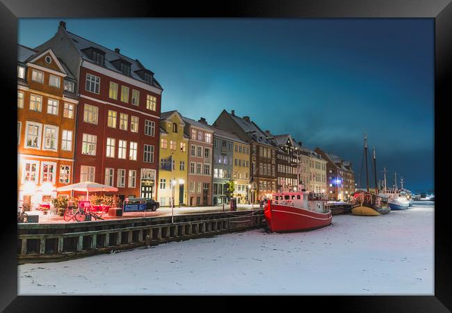 Frozen red ship in Nyhavn Copenhagen canal Framed Print by Dalius Baranauskas