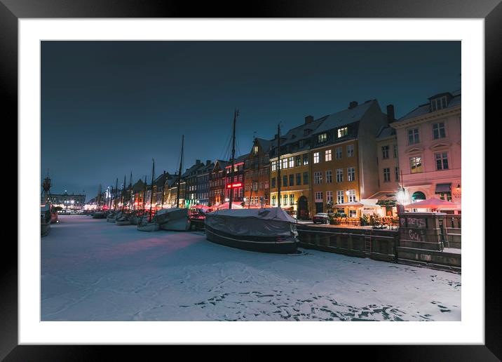 Frozen Nyhavn canal in winter Framed Mounted Print by Dalius Baranauskas