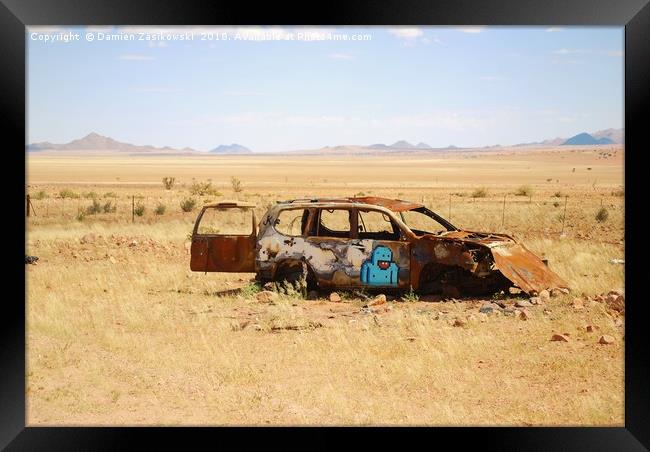 Abandoned car somewhere in Namibia Framed Print by Damien Zasikowski