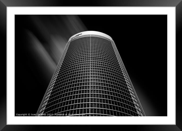 Low angle view of skyscraper against sky in Madrid Framed Mounted Print by Juan Jimenez