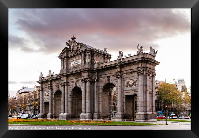 Puerta de Alcala in Madrid at sunset Framed Print by Juan Jimenez