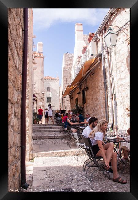 Enjoying life outside in Dubrovnik Croatia  Framed Print by Holly Burgess
