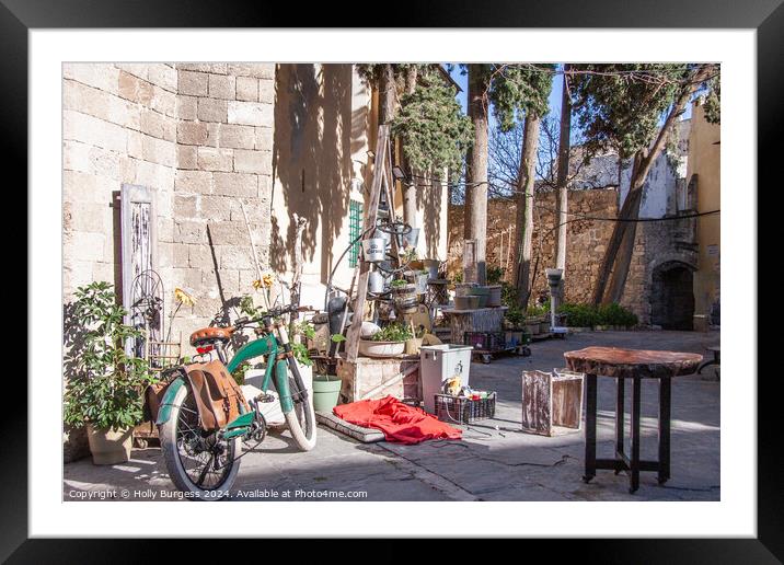 Side shop working on old antquies in Rhodes Greece  Framed Mounted Print by Holly Burgess