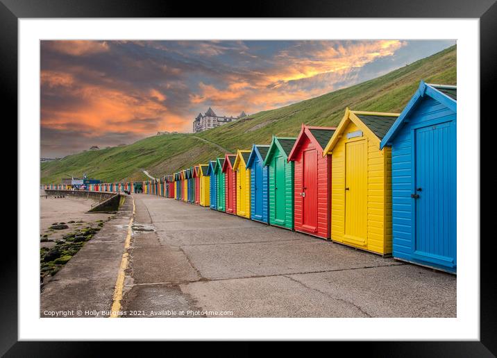 Whitby's Colourful Beach Huts at Sunset Framed Mounted Print by Holly Burgess