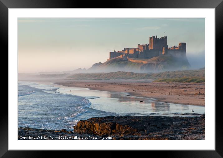 Dawn reflections of Bamburgh Framed Mounted Print by Brian Pain