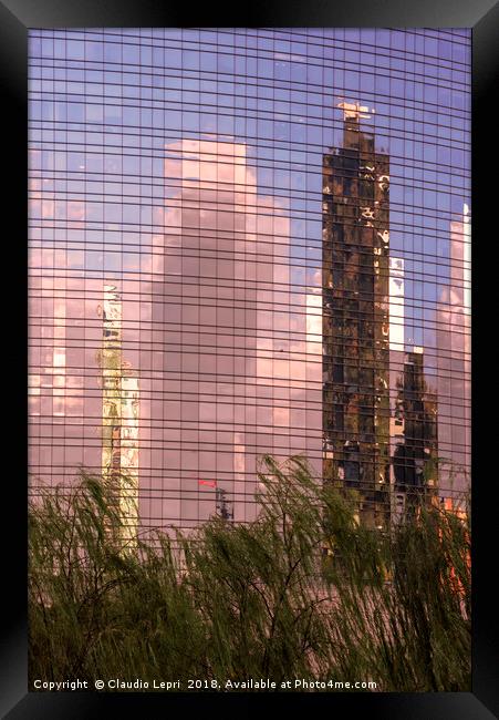 Green towers on mirror-glass Framed Print by Claudio Lepri